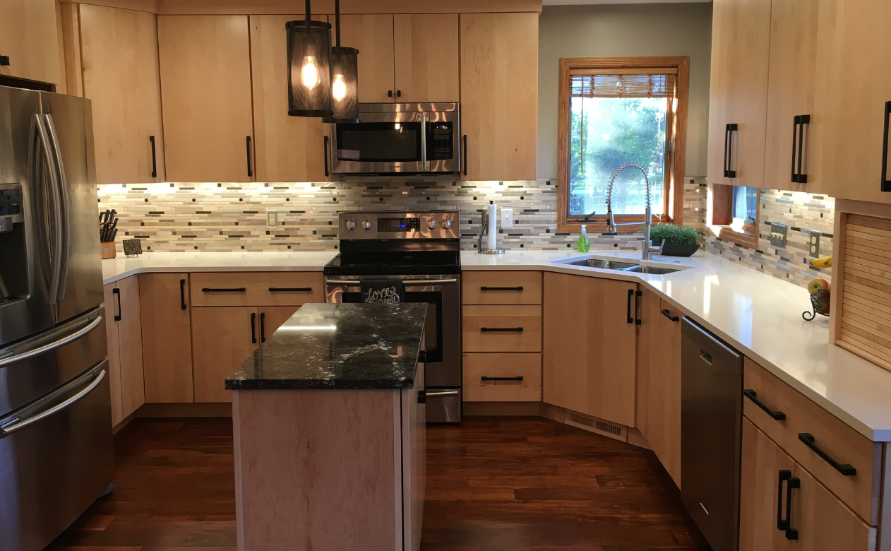 Wooden kitchen cabinets with black hardware